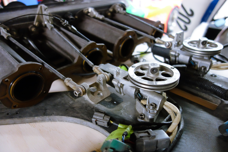 Illustration for article titled Mazda's All-Conquering 700 HP Four-Rotor Le Mans Engine Has The Coolest Intake Ever